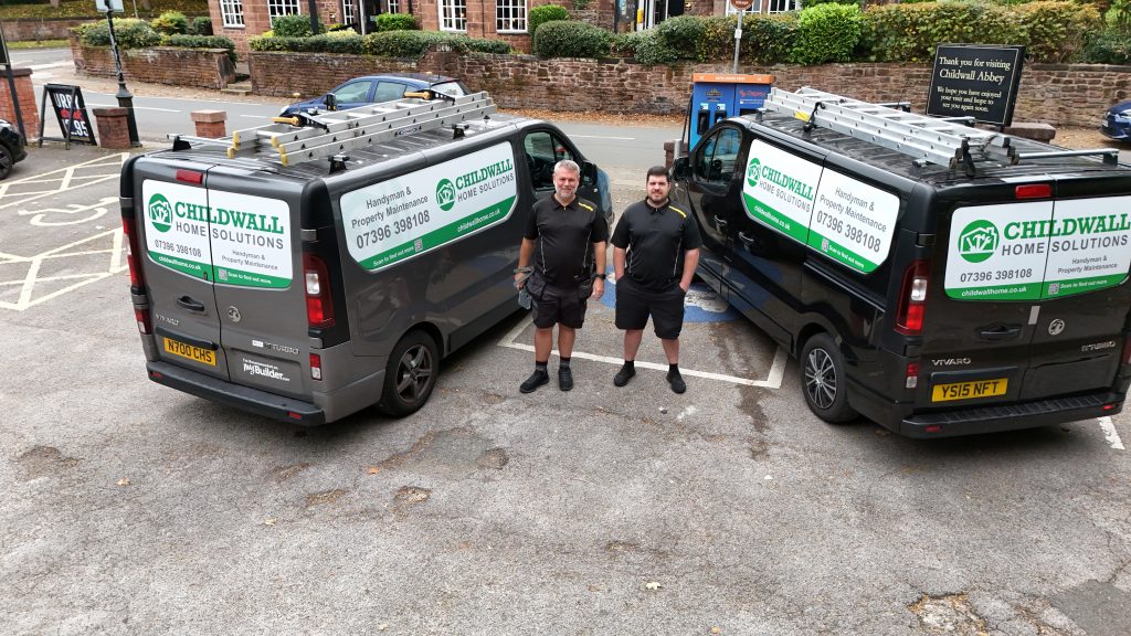 Two men with two vans